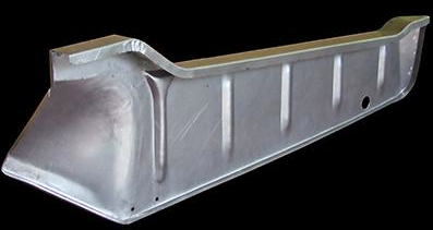 Metal car part, a rocker panel, silver and shaped with vertical ribs.