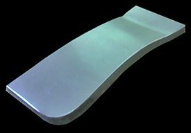 Curved metal plate with a raised rectangular end on a black background.