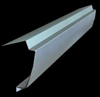 Metal flashing for a roof, shaped like a long, angled gutter.