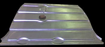 A metal car panel with horizontal indentations and holes, on a black background.