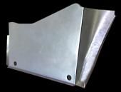 A silver metal car part, angular and shaped for a vehicle's interior.