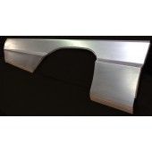 Metal car quarter panel, unpainted, showing a wheel well arch and side panel.