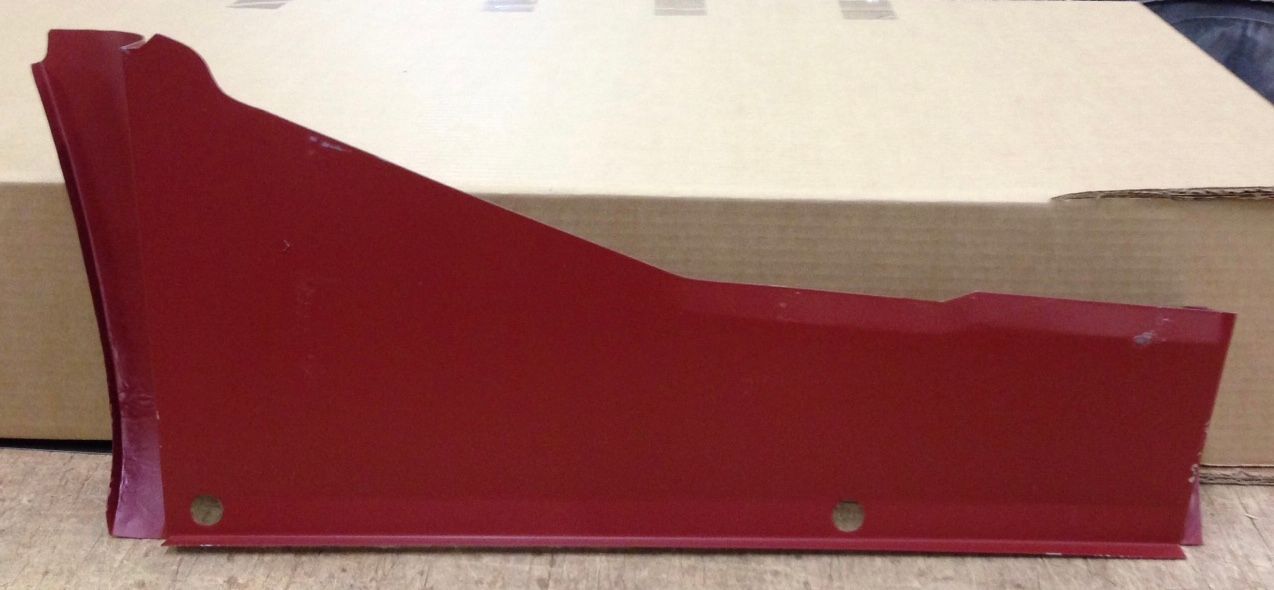 Red metal panel with a sloping top edge.