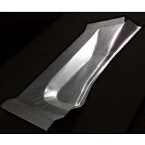 Shiny, metallic, irregularly shaped tray on a dark surface.