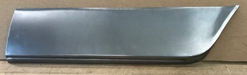 Metal car panel, gray with a curved corner and a folded bottom edge.