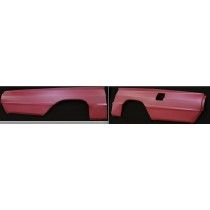 Two red car quarter panels against a black background.