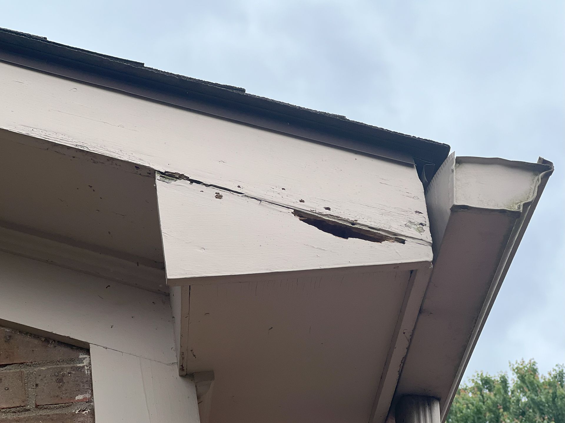 A close up of a roof with a hole in it.