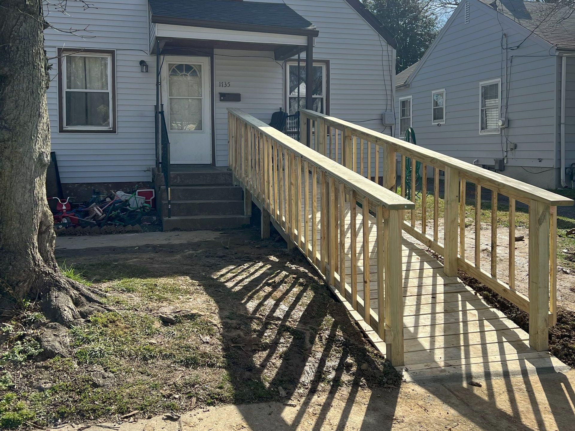 WP Home Repair builds custom ramps - displayed is a ramp in front of a house.