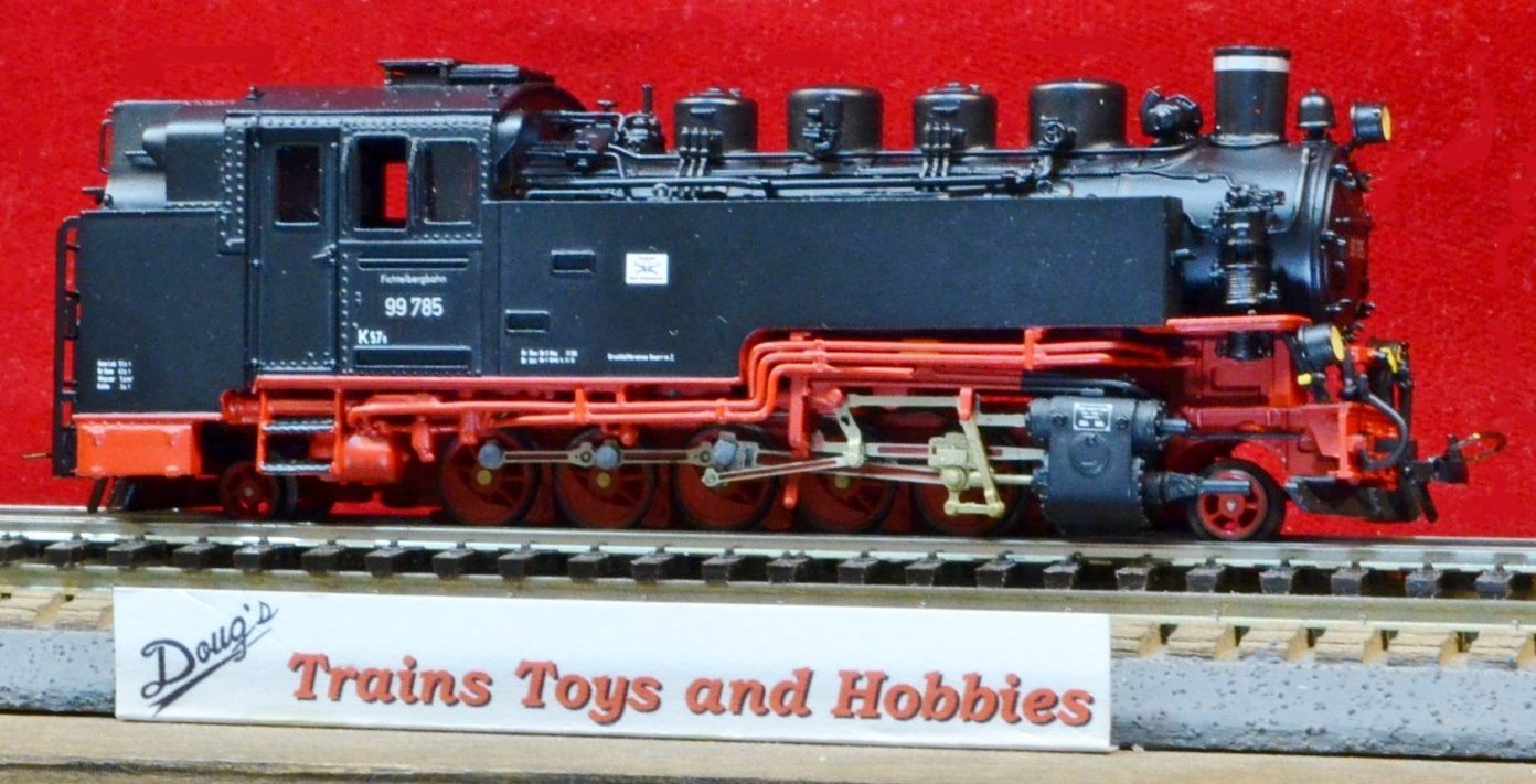 A model train is on display at trains toys and hobbies