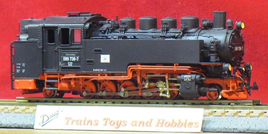 A model train is on display at trains toys and hobbies