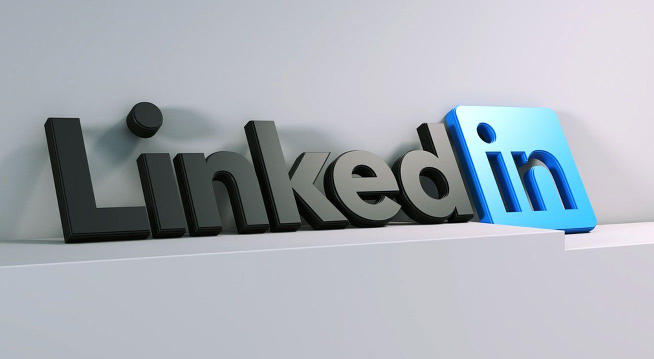 The word linkedin is written in black and blue letters