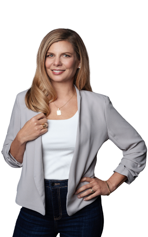 Beth Schadler standing  headshot with Logo