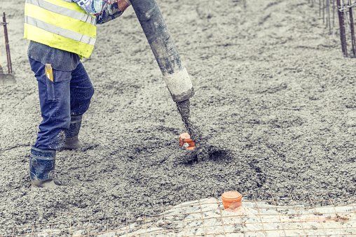 Worker Pouring Concrete — Concrete Pumping in Pittsburgh PA