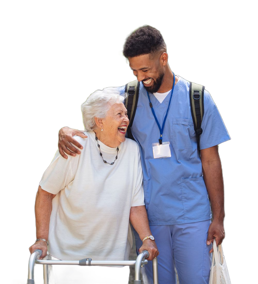 Nurse in blue scrubs laughs with a woman with a shaved head, indoors. Nurse in blue scrubs laughs with a woman with a shaved head, indoors.