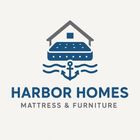 Logo for Harbor Homes mattress and furniture, features a house over a mattress with an anchor on waves.