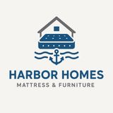 Logo for Harbor Homes mattress and furniture, features a house over a mattress with an anchor on waves.
