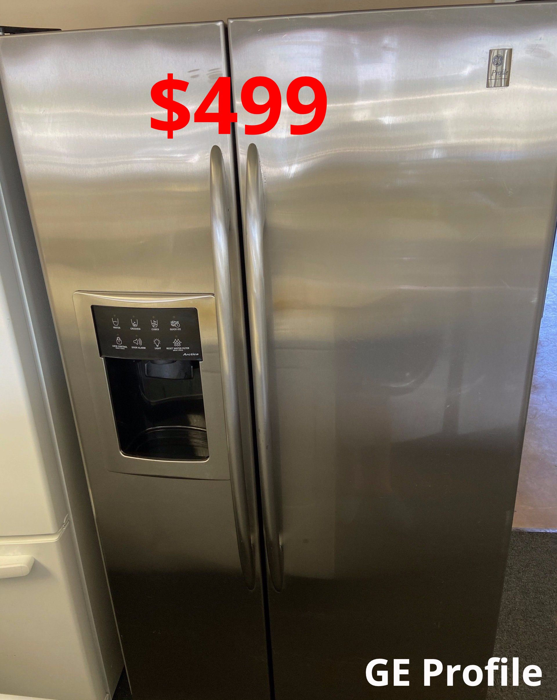 A stainless steel refrigerator is for sale for 499 dollars