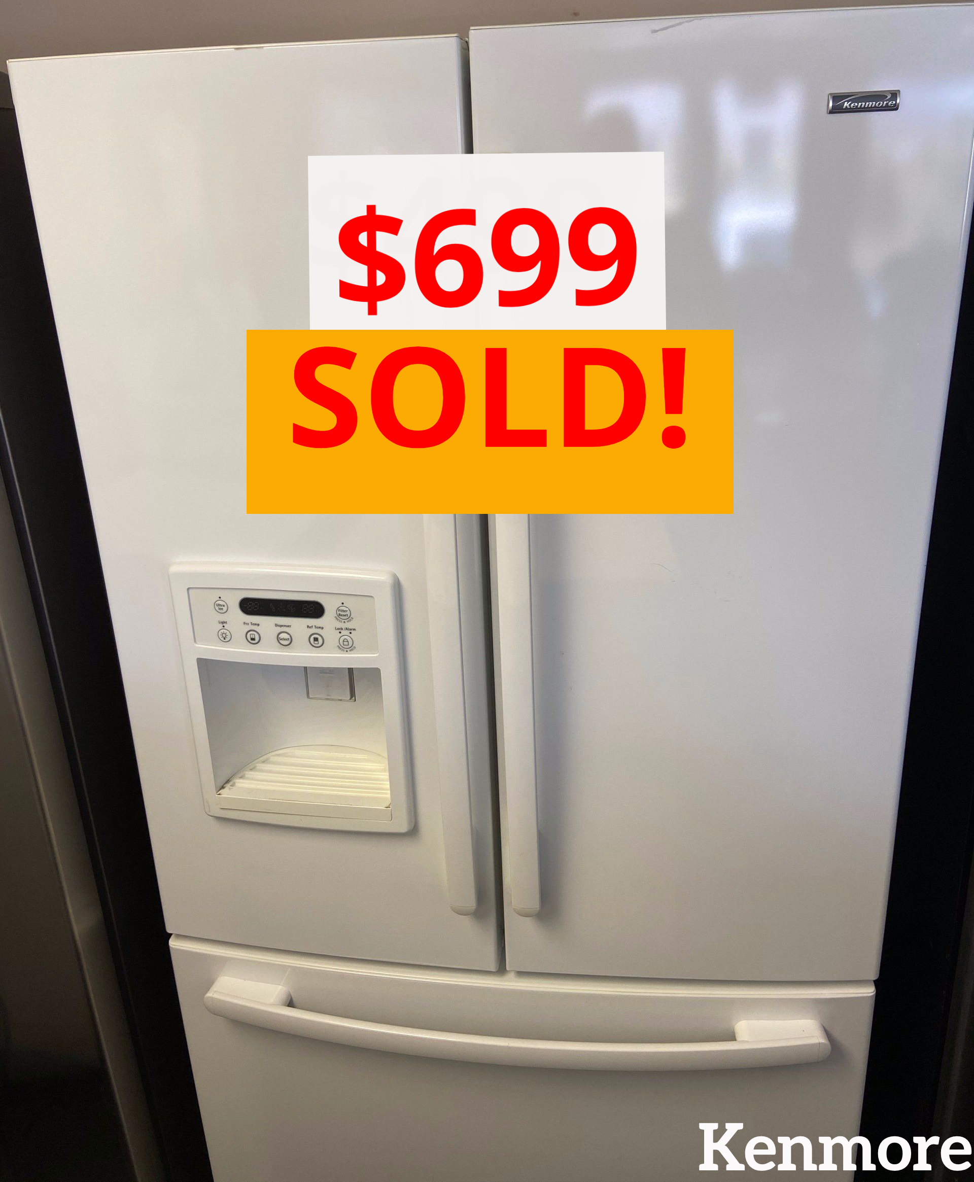 A kenmore refrigerator is for sale for $ 6.99