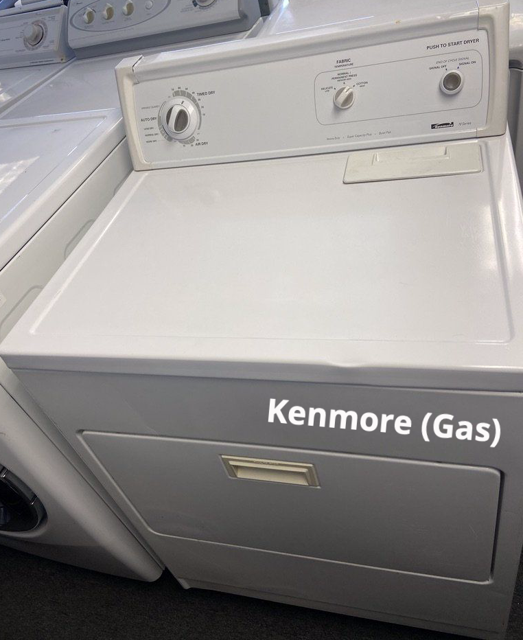A white kenmore gas washer and dryer