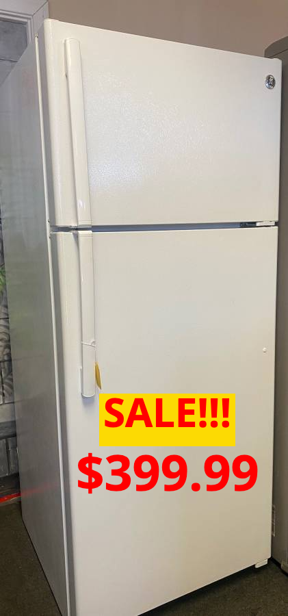 A white refrigerator is on sale for $ 399.99