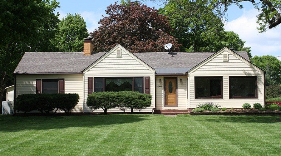 House with White Siding — Waukee, IA — Allstate Gutter & Siding