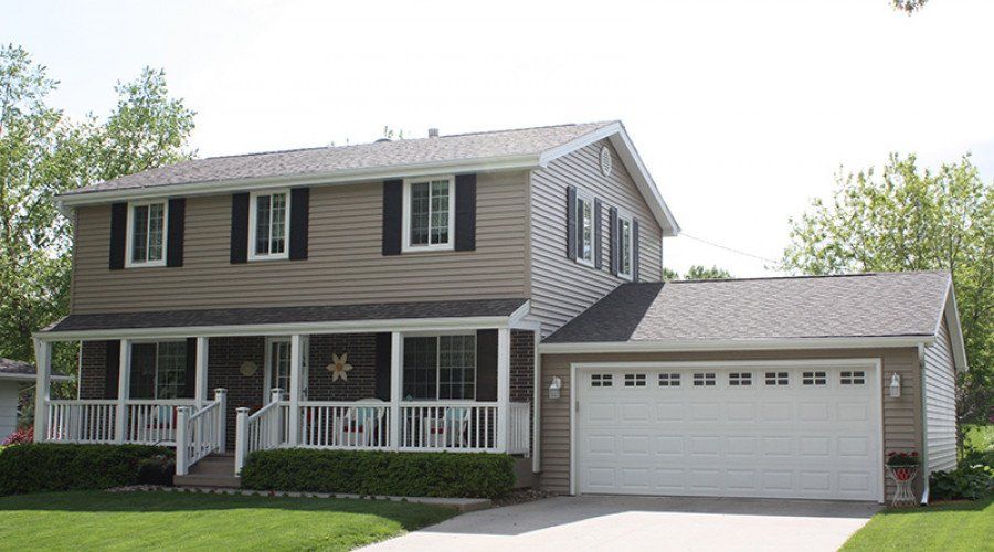 House with Brown Siding — Waukee, IA — Allstate Gutter & Siding
