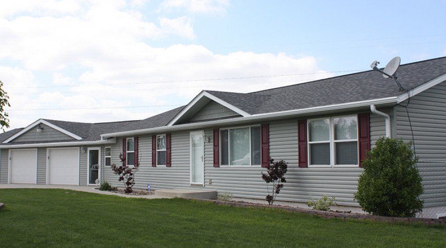 House with Gray Siding — Waukee, IA — Allstate Gutter & Siding