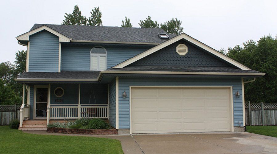 House with Blue Siding — Waukee, IA — Allstate Gutter & Siding