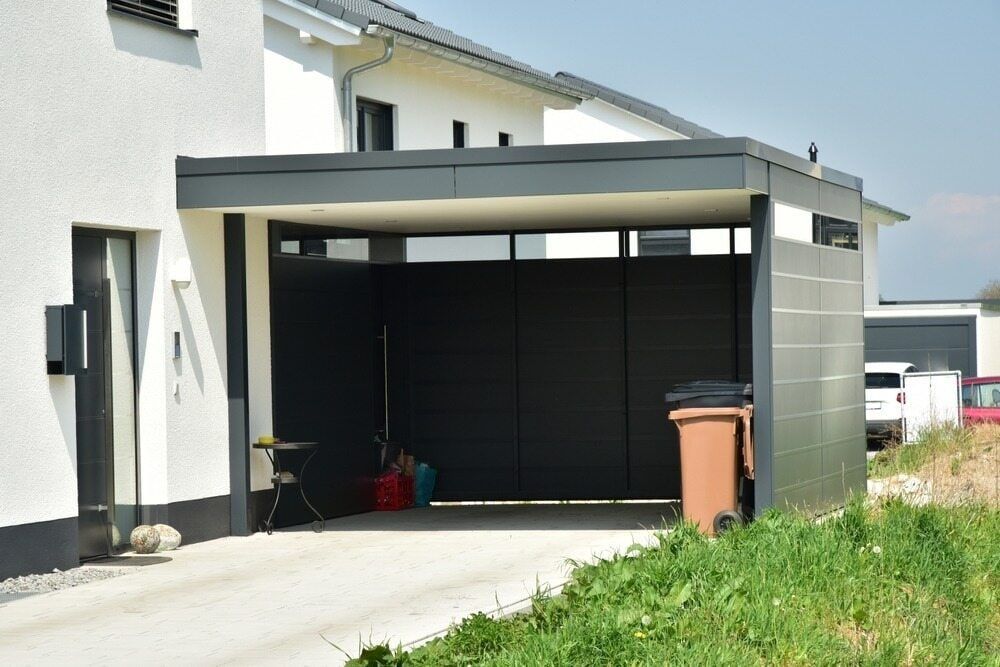 Modern Open Garage With a Flat Roof Attached — Brett Continuous Concrete Kerbing & Edging In Lake Cathie, NSW