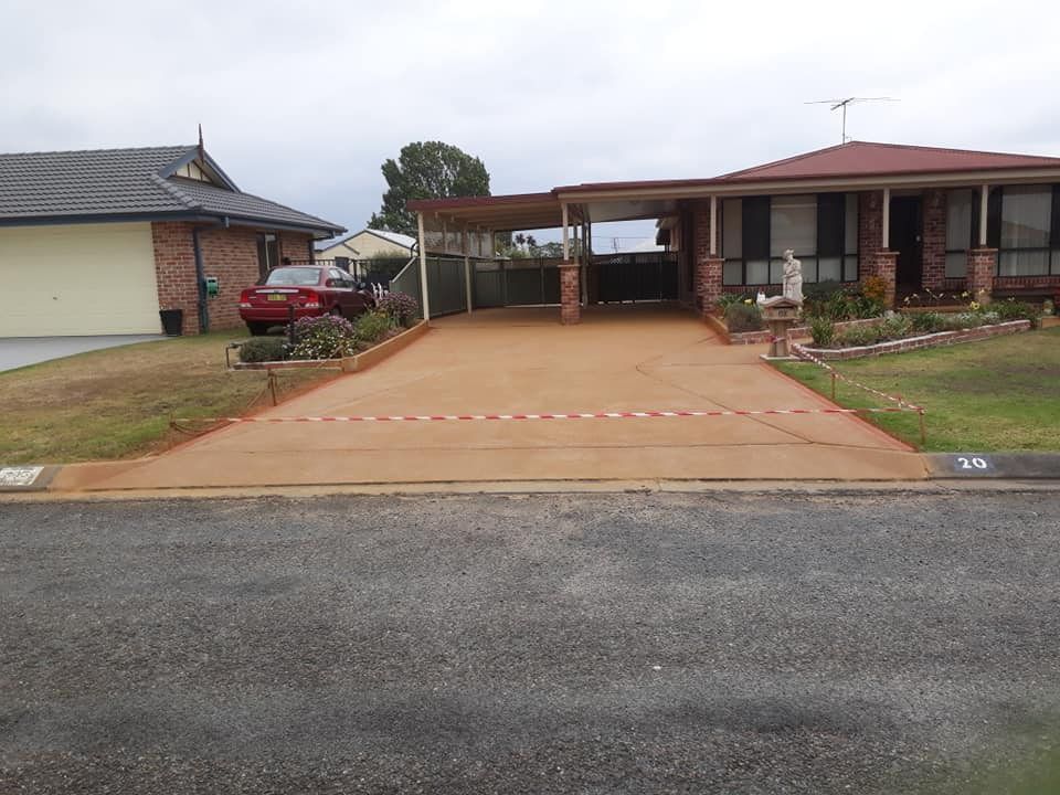 A Freshly Poured Concrete Driveway  — Brett Continuous Concrete Kerbing & Edging In Lakewood, NSW