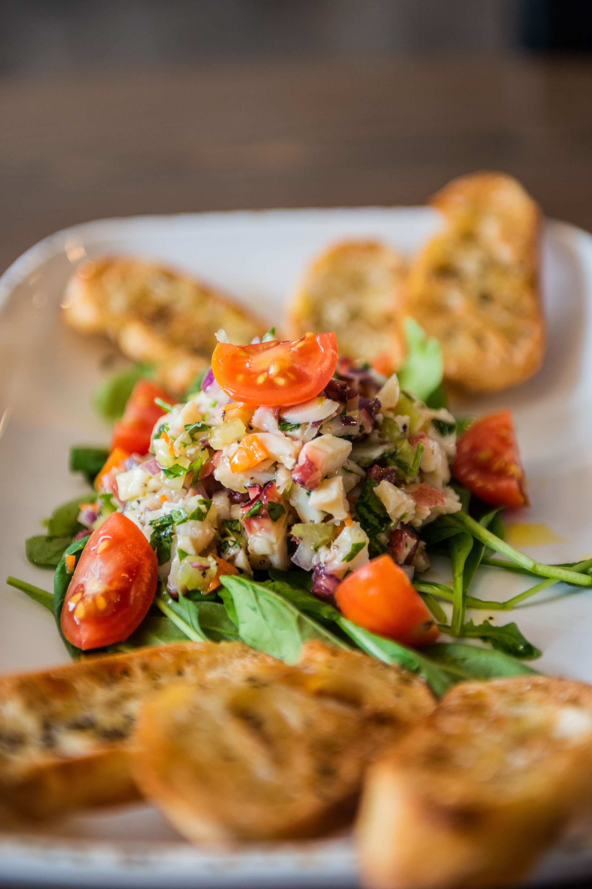 A close up of a plate of food on a table.