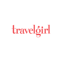The travel girl logo is red and white on a white background.