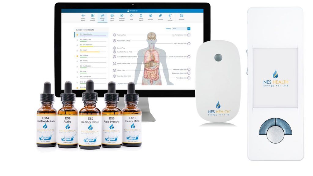 A computer monitor, a mobile scanner, and a bottle of essential oils.