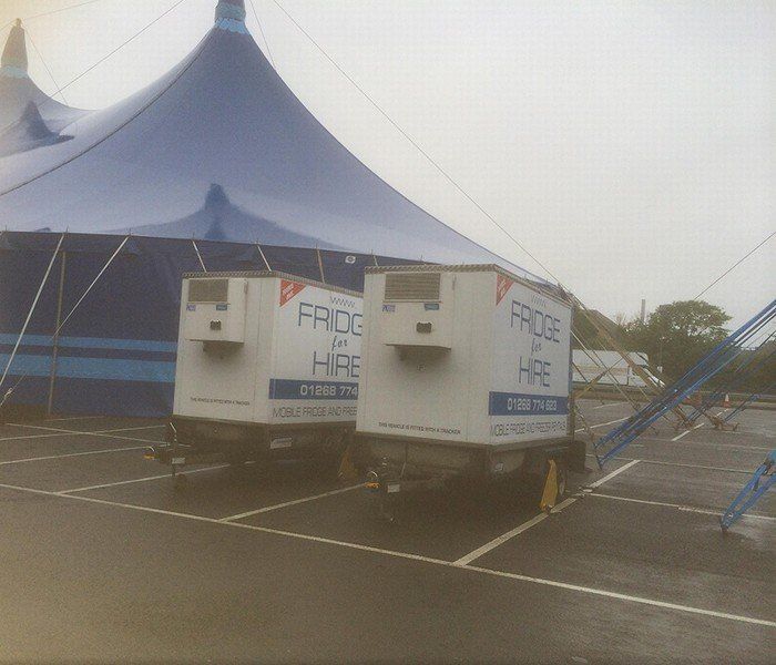 mobile fridge under a tent
