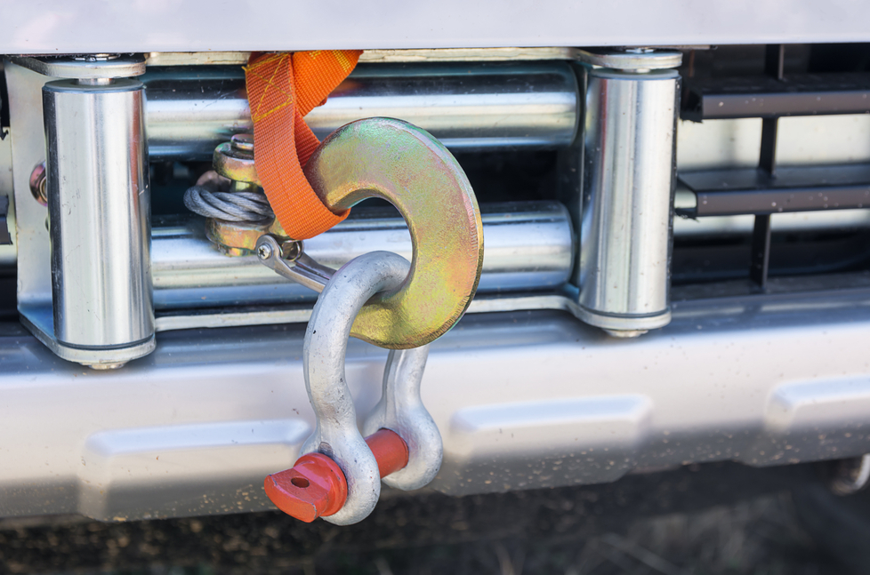 A Winch With A Shackle And Orange Strap Attached To Truck — Bigdog Welding and Fabrication Pty Ltd In Currajong, QLD