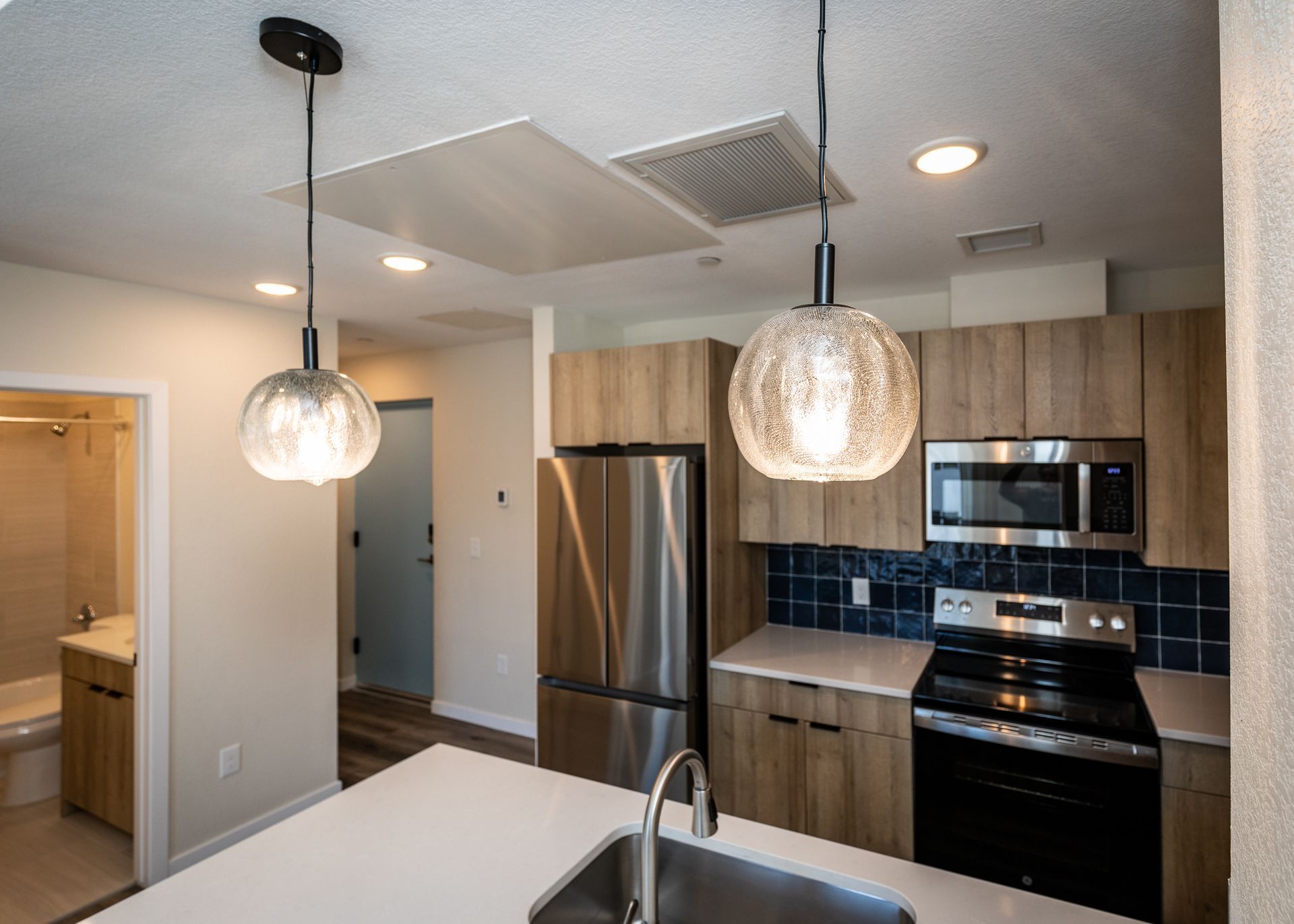 An artist 's impression of a dining room with tables and chairs.