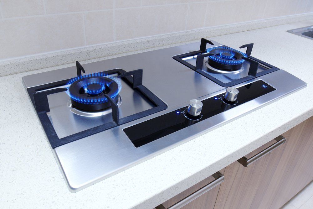 A Gas Stove With Two Burners is on a Kitchen Counter — Brightway Electrical in Mullumbimby, NSW