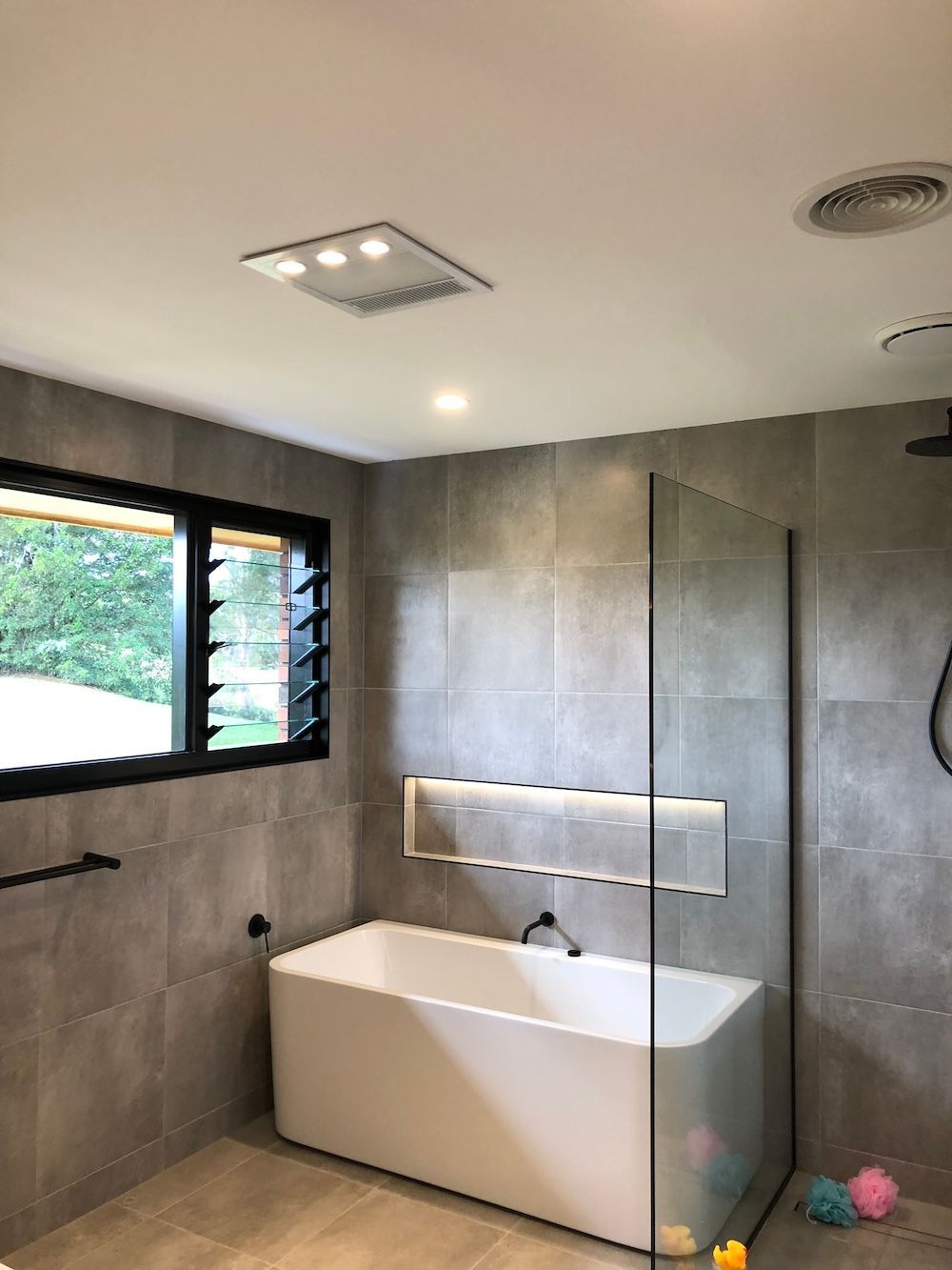 A Newly complete bathroom with bath tub and LED Lights — Brightway Electrical in Ballina, NSW
