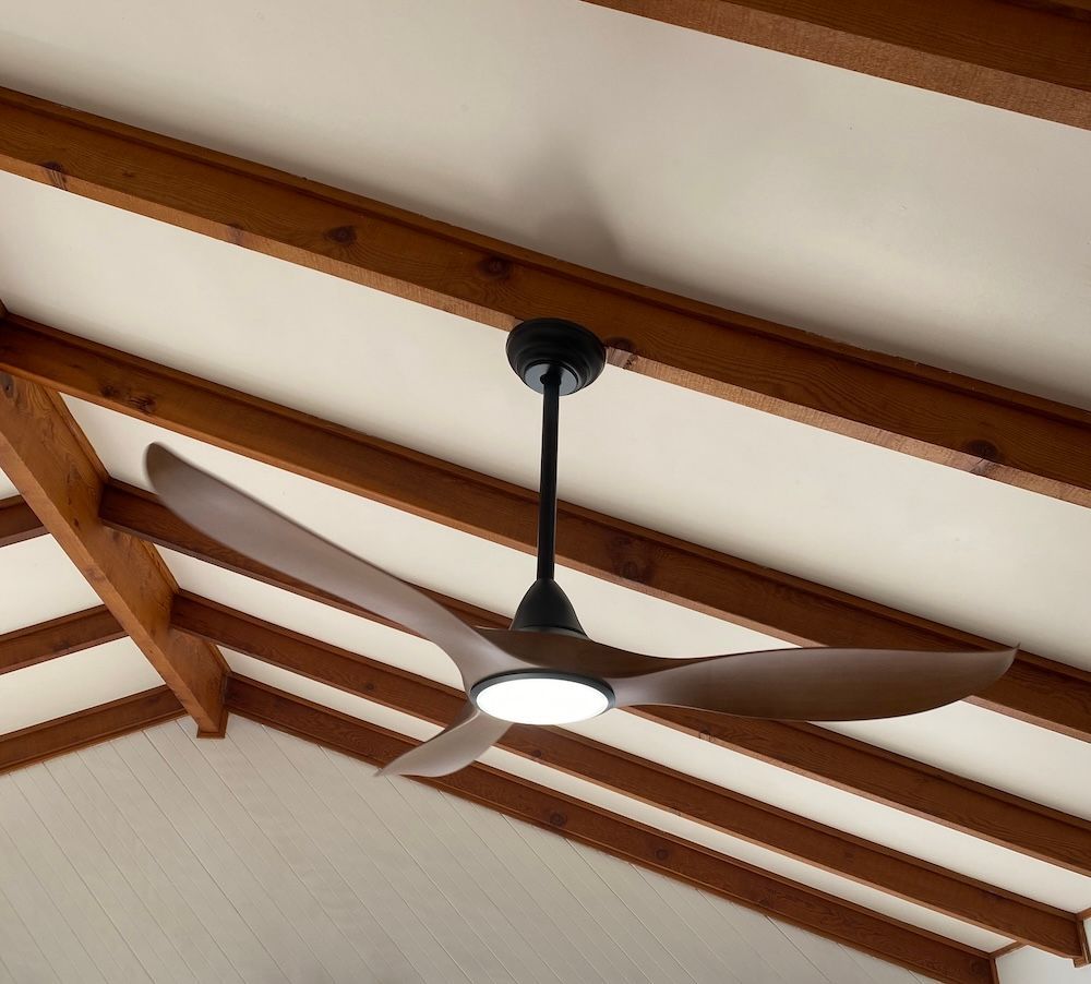 A Wooden Ceiling Fan with a Light — Brightway Electrical in Lismore, NSW