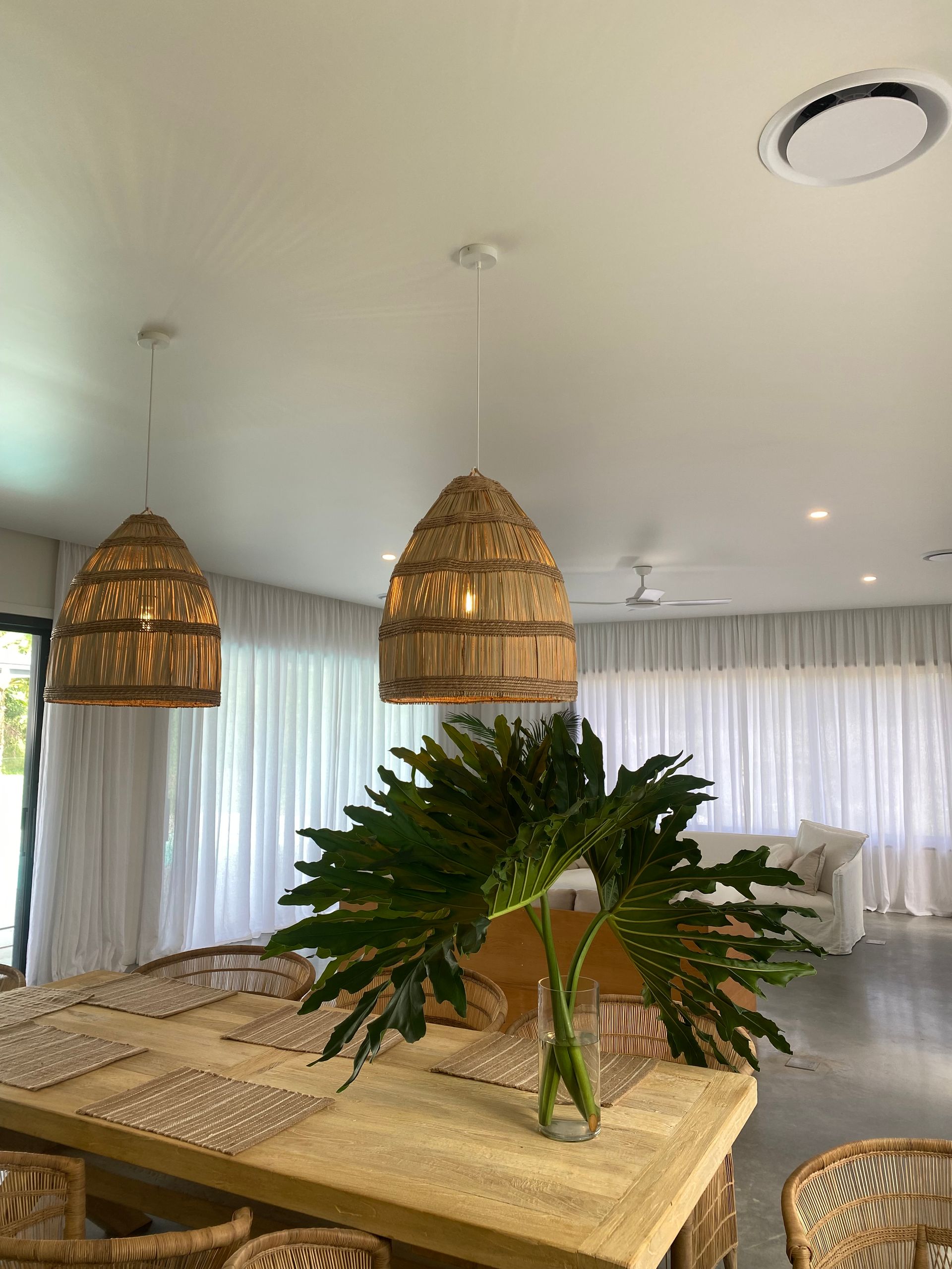 A Hobo style looking dining area with straw lights — Brightway Electrical in Ballina, NSW