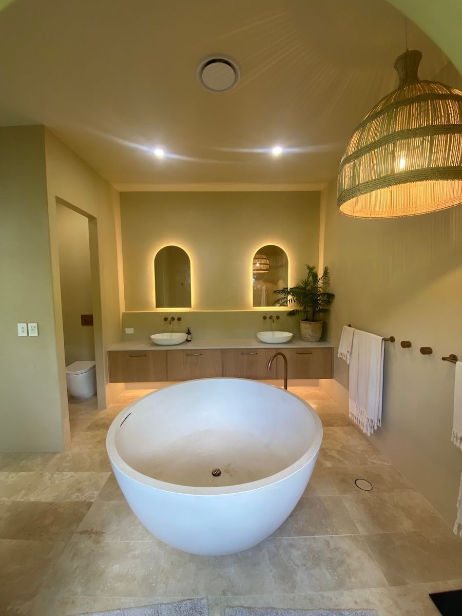 A Bathroom with Warm Lighting — Brightway Electrical in Lennox Head, NSW