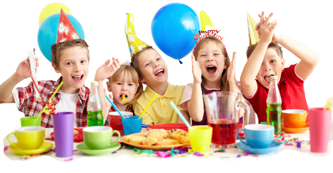 A group of children are sitting at a table at a birthday party.