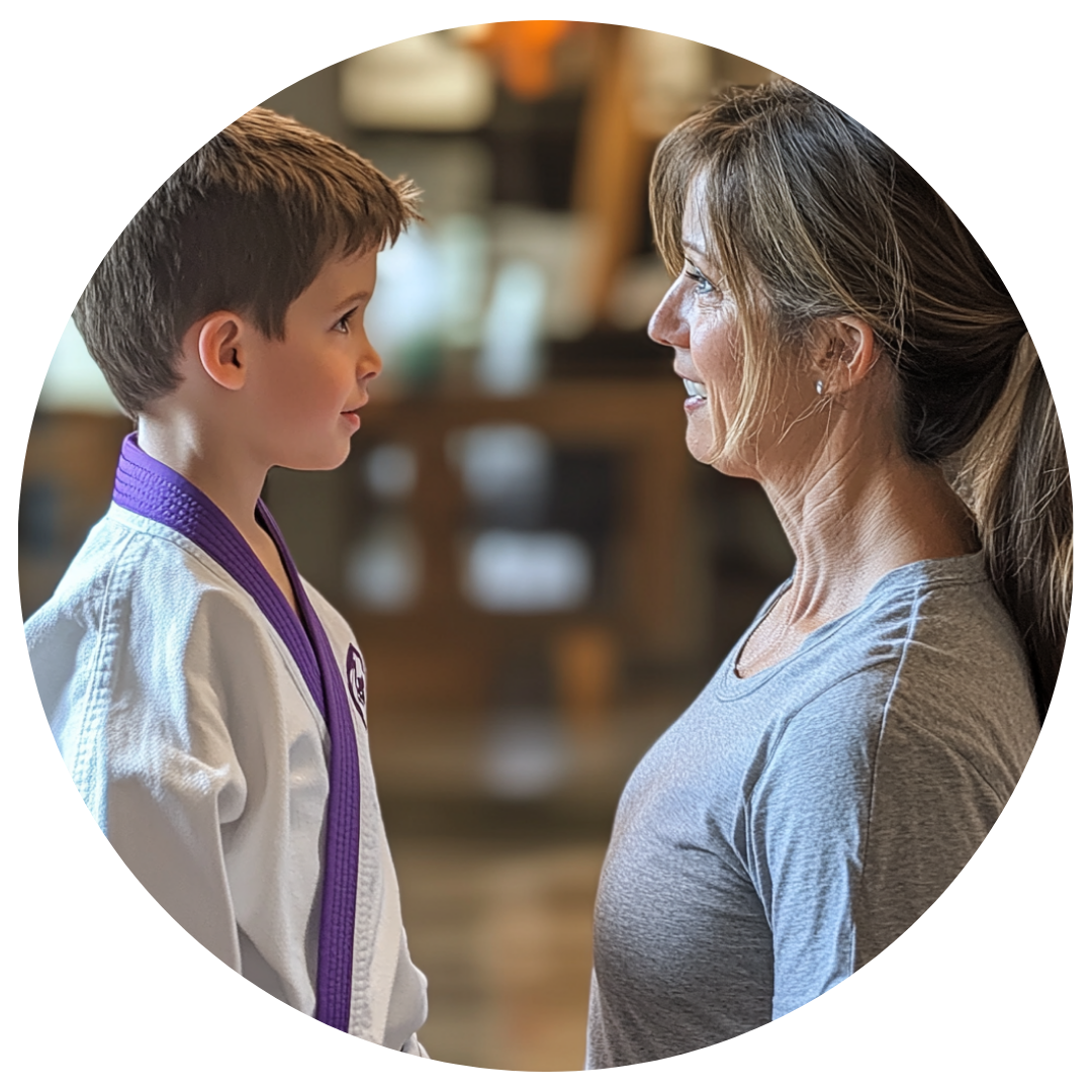 A woman and a young boy are looking at each other in a circle.