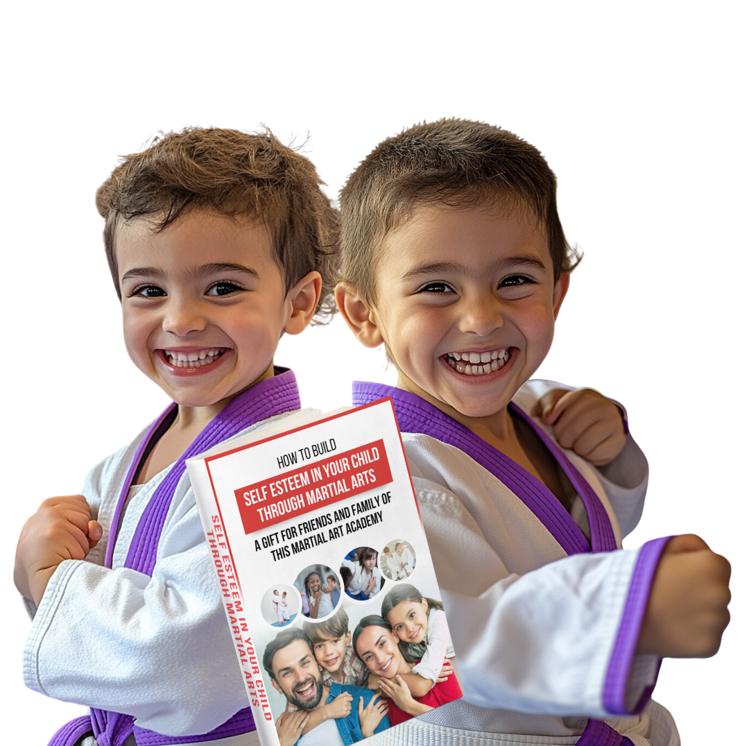 Two young boys in karate uniforms are holding a book.