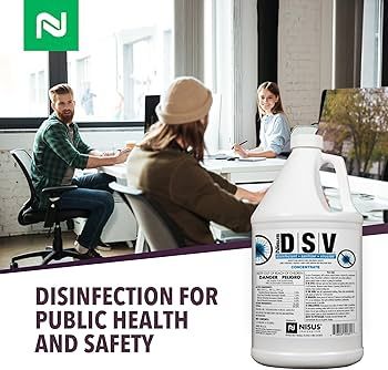 Person in protective gear wiping a dark wooden surface with a blue cloth, focused on the hand and cloth.