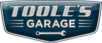 Logo for Toole's Garage. Text is silver on a blue background with a wrench.