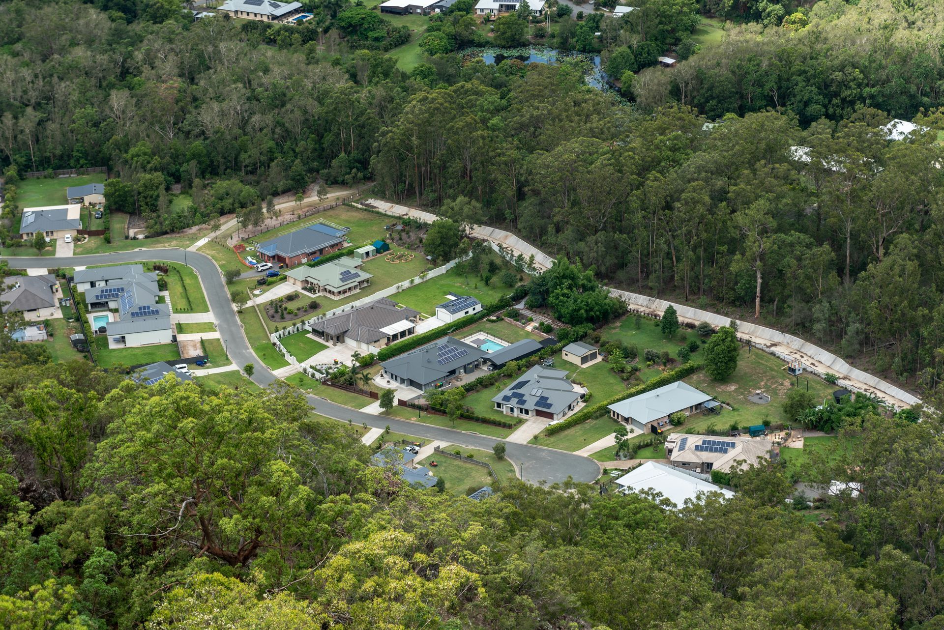 Houses Nestled in a Wooded Area, Accessed by Winding Roads — Diamond Real Estate QLD in Deception Bay, QLD