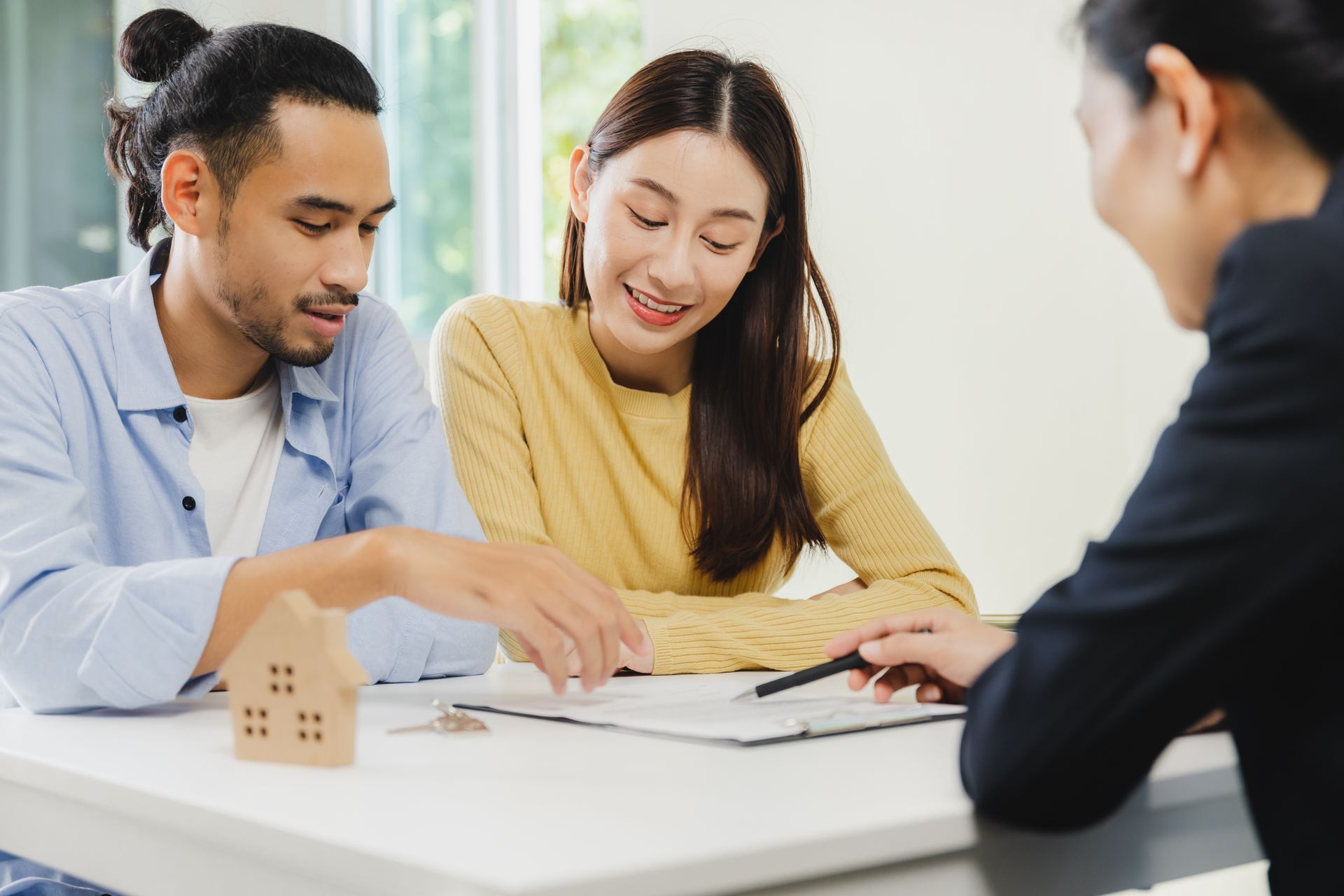 couple meeting with mortgage broker