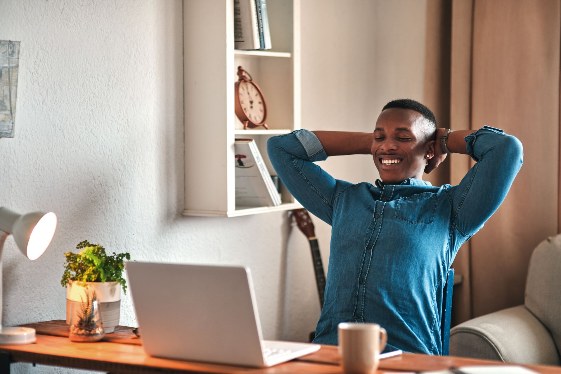 happy man relaxed at desk