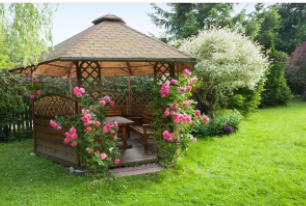 Custom Gazebo installed with roses along edge for a unique look.